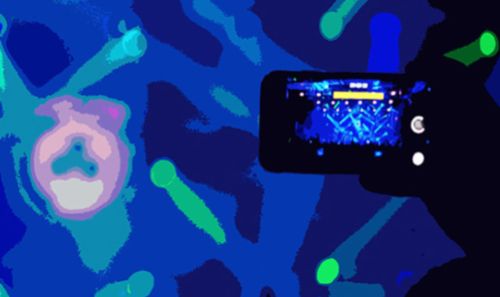 Graphic of camera at concert