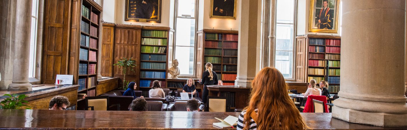 People studying in Christies Cafe on The University of Manchester campus.