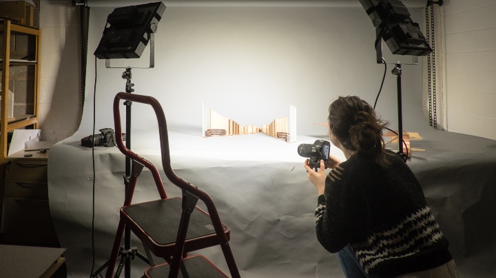 Student photographing in studio
