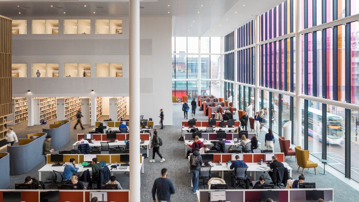 Students working at desks in the University Business School