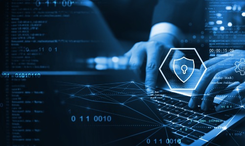 Person typing on keyboard with various security graphics.