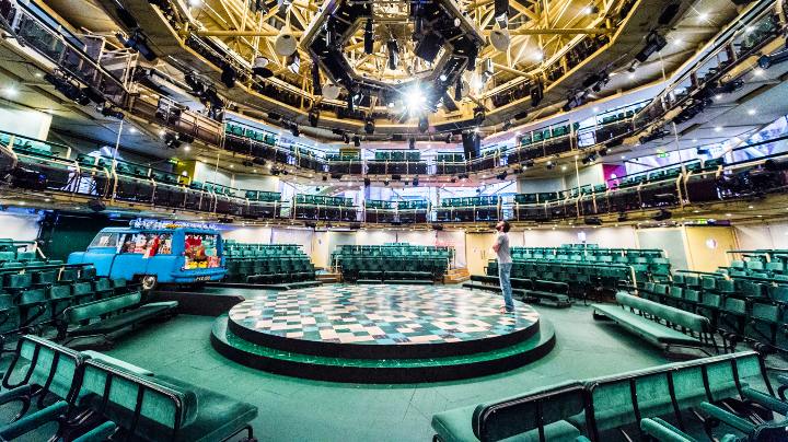 Lighting, seats and stage of a drama theatre.