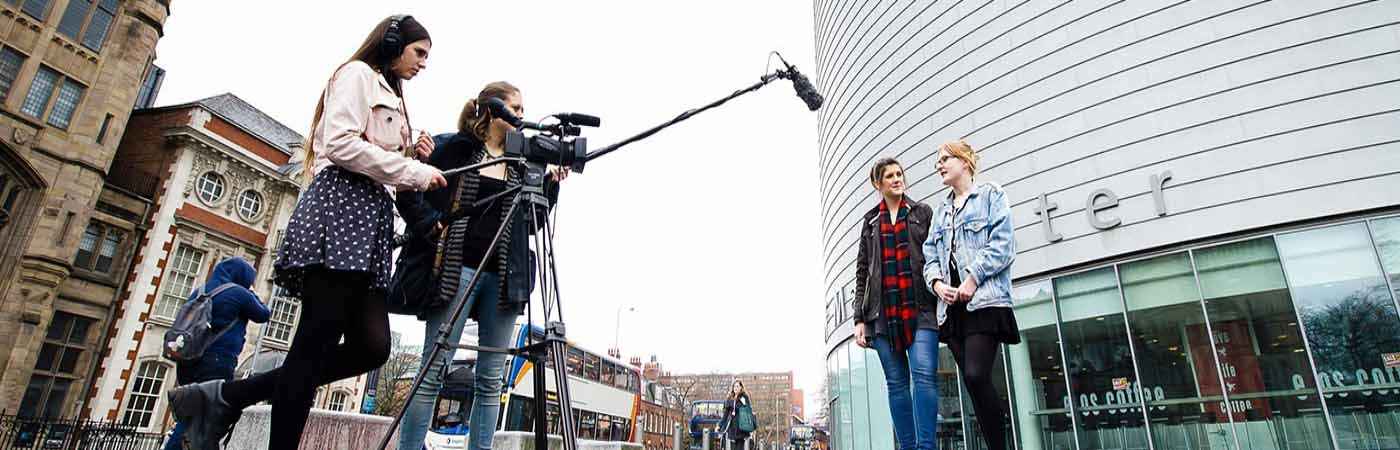 Students filming outside university