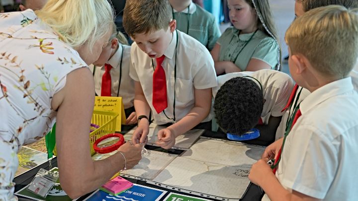 Schoolchildren learning science at a university event