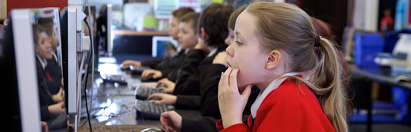 Children working in a computer cluster