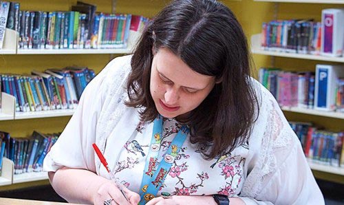 Teacher marking schoolwork.