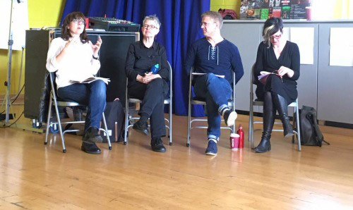 Panel of four speakers.
