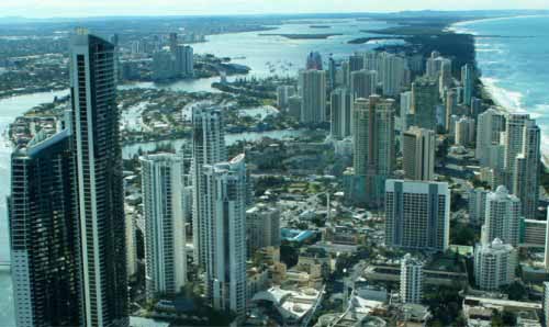 A photograph of a built up city on the coast