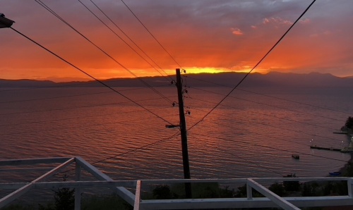 A scenic landscape with electricity cables