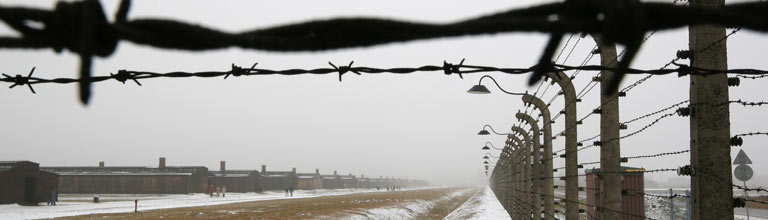 Close up of barbed wire around a prisoner of war camp