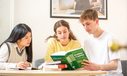 a group of students having a discussion