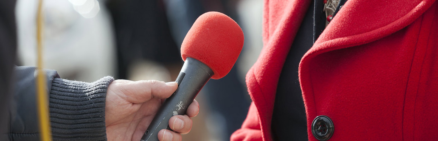 Close up of an interviewer's microphone