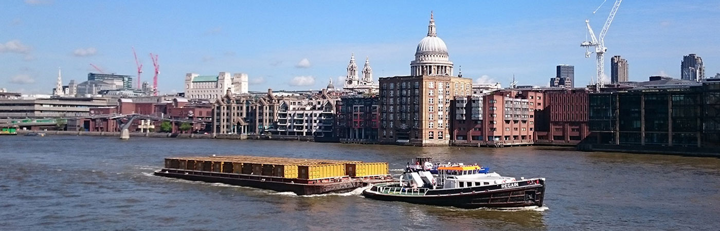 cargo ship on the River Thames, London