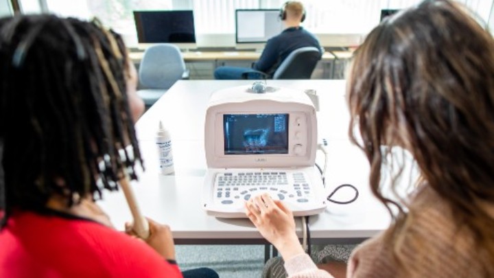 Research staff using technology