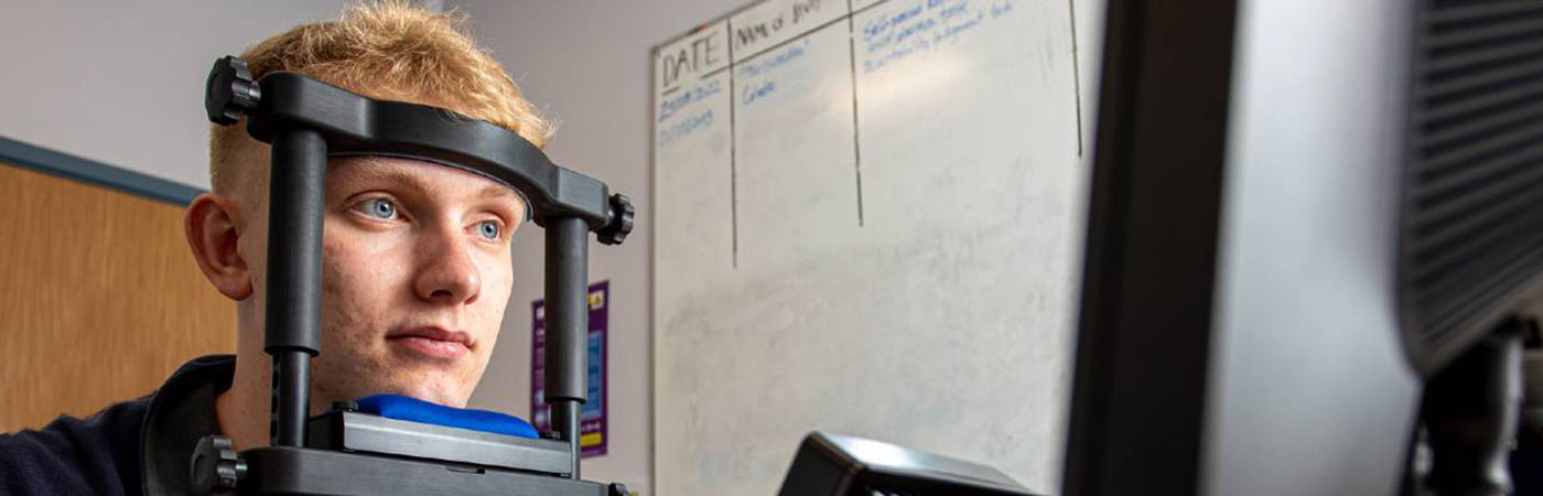 Man playing a game as part of an experiment