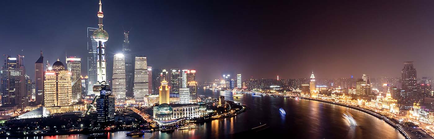 Shanghai skyscrapers and riverfront at night