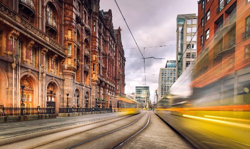 Time lapse image of trams in Manchester city centre.