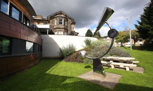 A garden with a bench