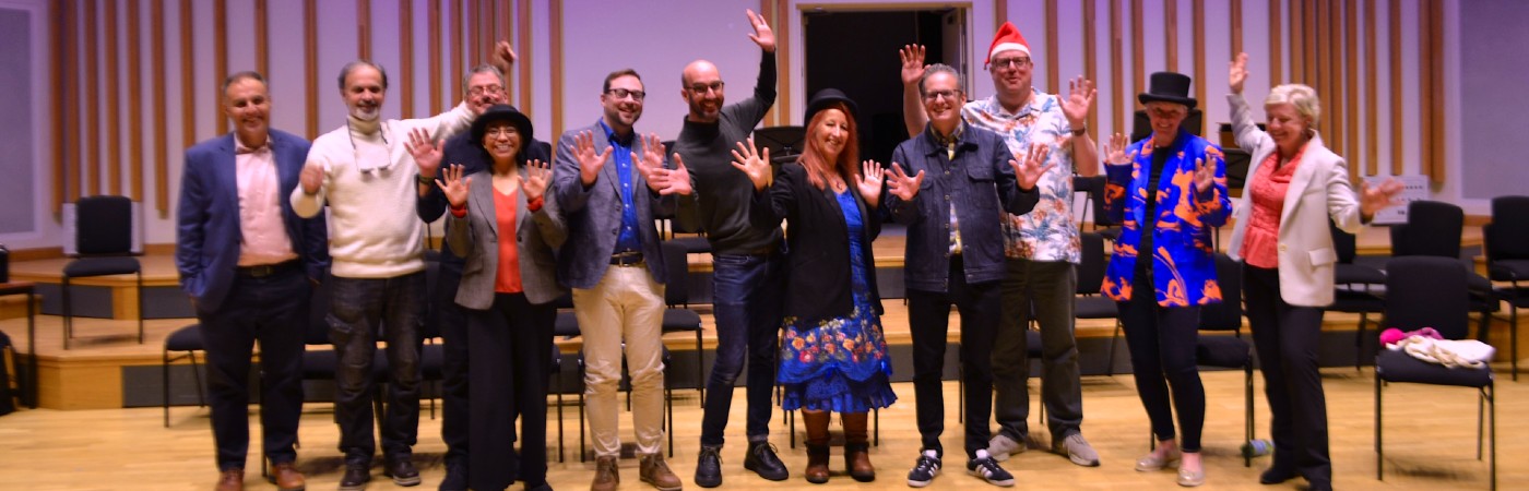 Music staff posing for a photo.