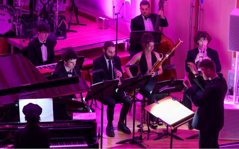 An orchestra performing. 