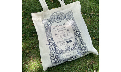 A photo of a goodie bag from the Manchester Music Analysis Conference 2025.