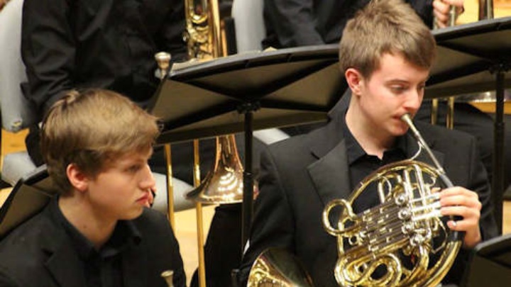 Students playing the trumpet