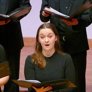The Cosmo Singers performing