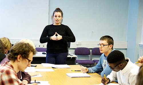 Student presenting to peers