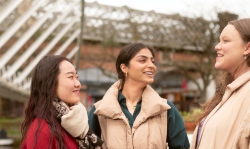 Three University of Manchester students in Castlefield.