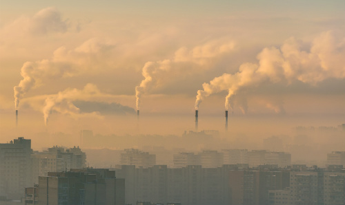 Industrial chimneys in the distance