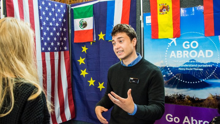 Advisor speaking at an international fair stand