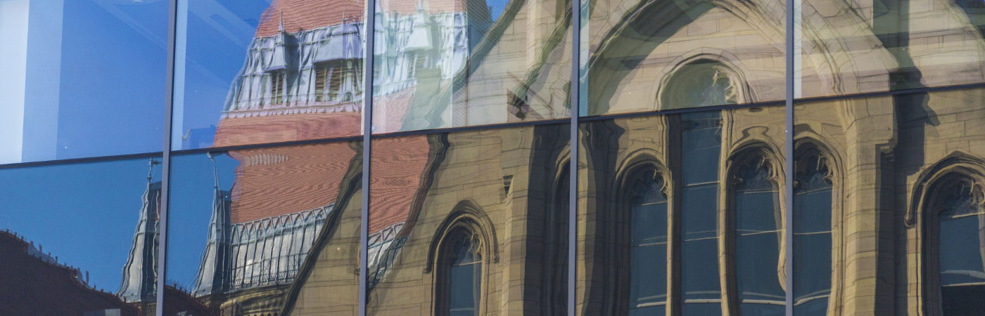 building reflected in windows
