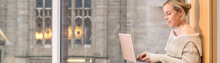 Religions and theology event in progress.  Scholar speaking at seminar.