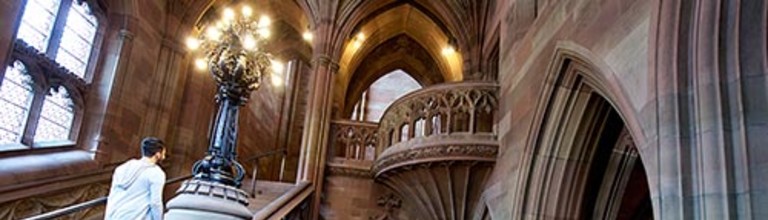 Students walking on the library stairs