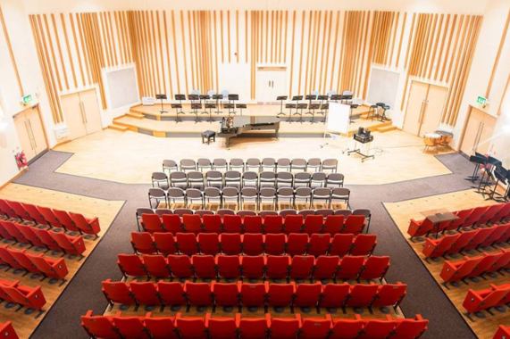 Stage and rows of seats in the Martin Harris Music Centre