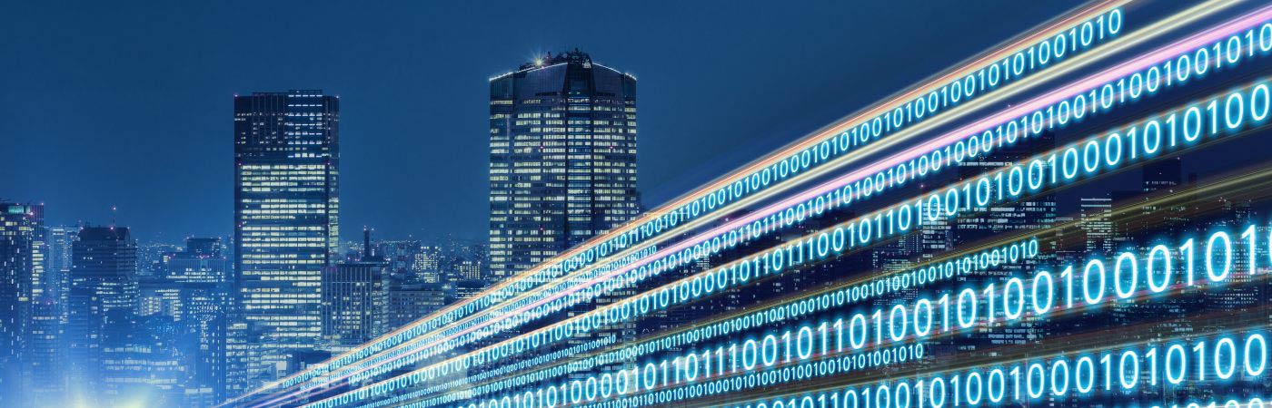Digital transformation conceptual image of binary numbers overlaid on a city skyline
