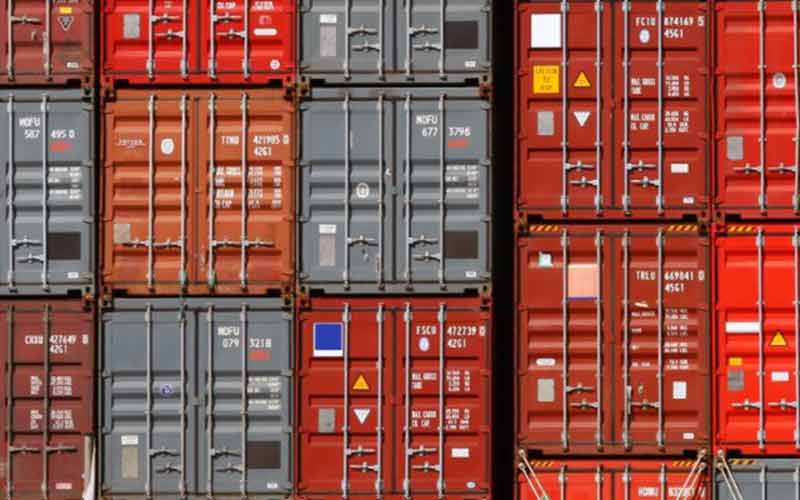 stacked colourful shipping containers