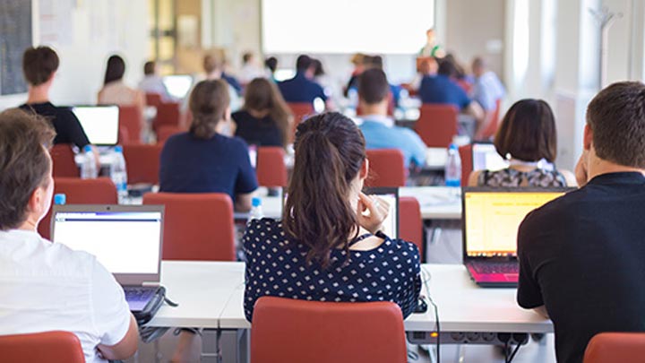 Students attending a lecture.