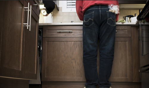 Person washing up in the kitchen