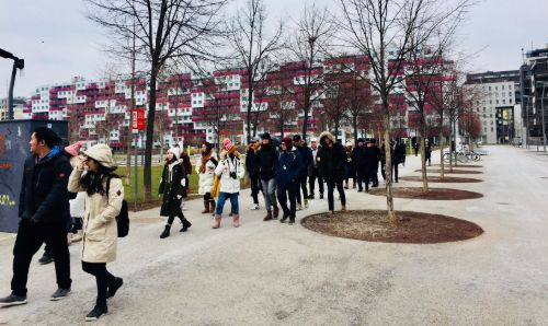 A group of people on a walking tour.