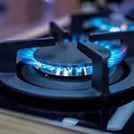 Lit gas ring on cooker