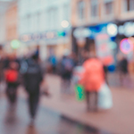 Blurred image of people walking in street