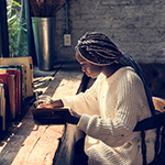 Portrait of woman with dreadlocks hair