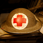 Helmet with a red cross on