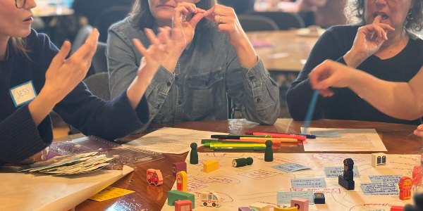 Researchers discussing key work