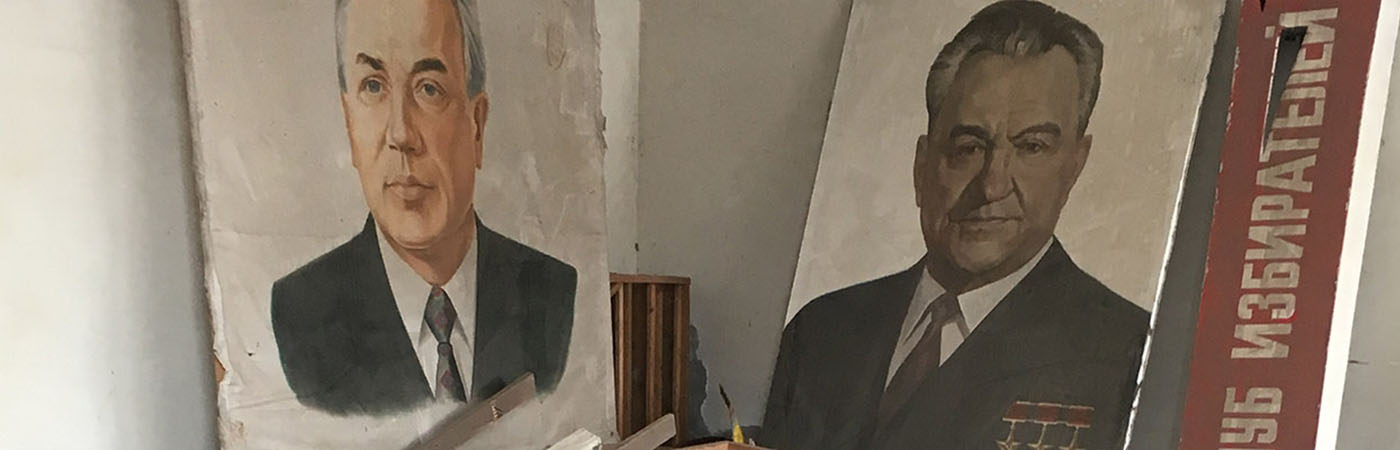 Posters in ruined building