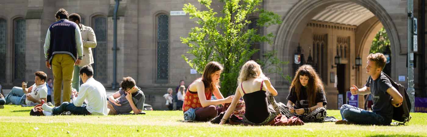 Group of students sat on campus