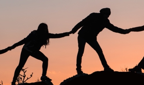 Shadow people holding hands 