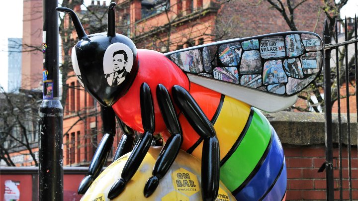 Statue of a multi-coloured bee
