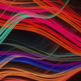 An abstract light swirl of many colours.